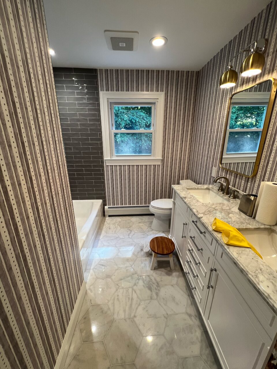 Bathroom with freestanding tub and vanity